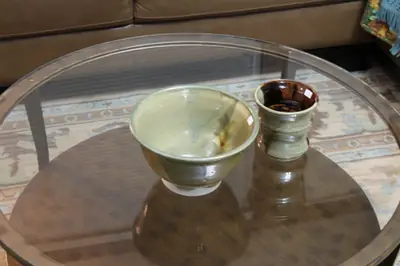 Bowl and cup. The green bowl paired with a banded cup.