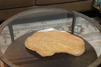 Slab platter. Free-form slab platter with an impressed surface and soft flashing.