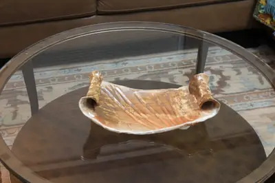 Scroll tray. Slab tray with rolled ends, like an open scroll.