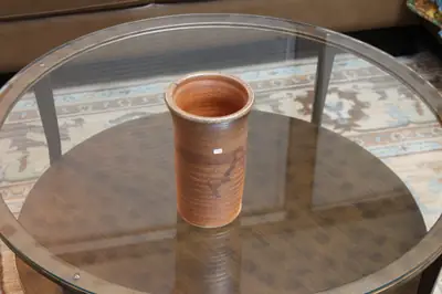 Brown cylinder vase. Tall cylinder vase in red-brown.